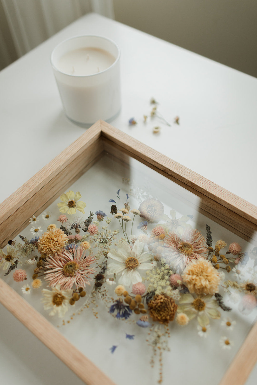 Preserved bouquet frame on table